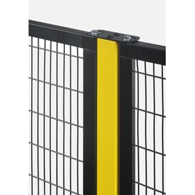 Close-up image of black metal protective fence section with welded wire mesh and a central yellow square post topped with a mounting plate secured by bolts.