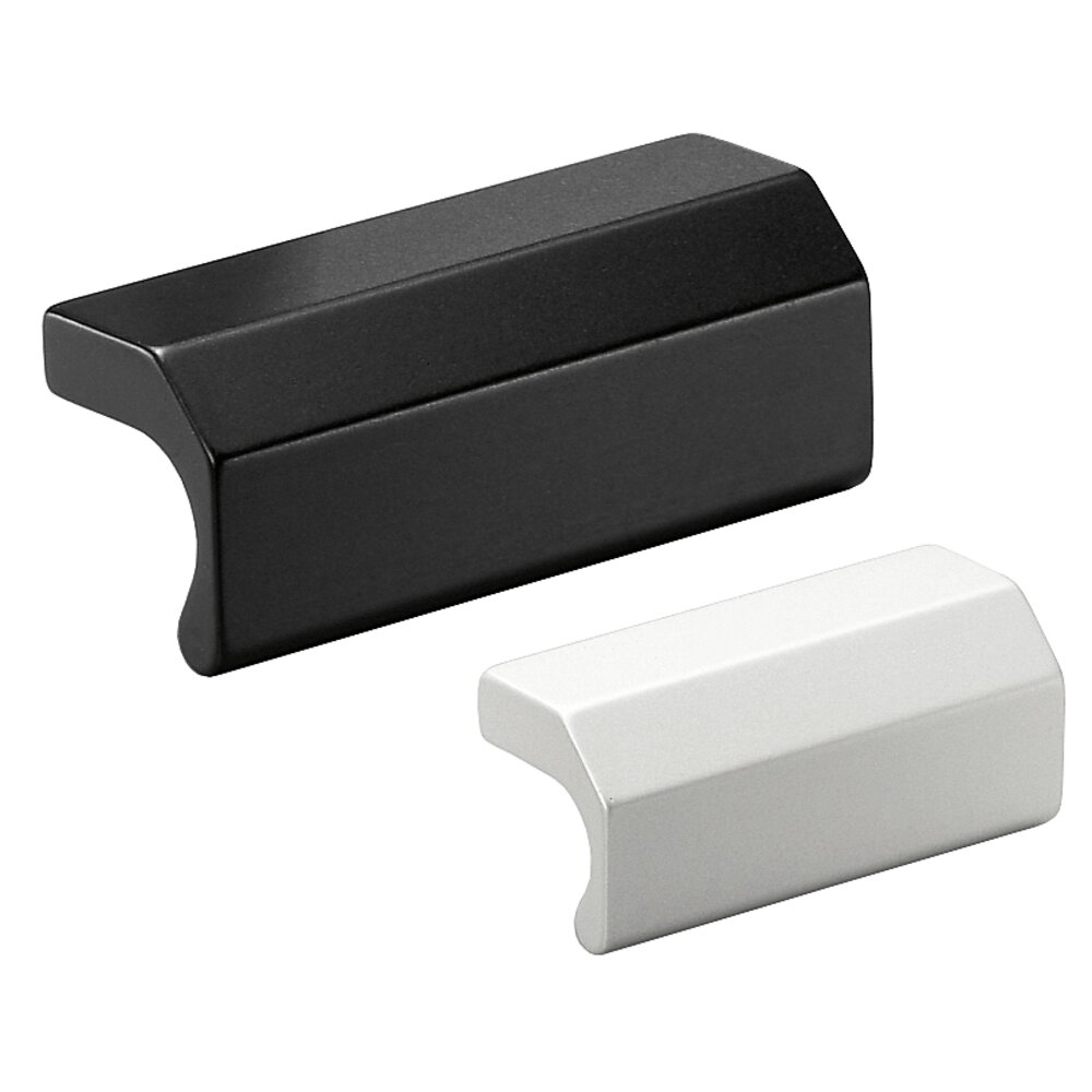 Black and white front panel handles made of profiled aluminium with a matt surface finish.