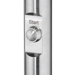 Close-up of a stainless steel push-button labeled 'Start' on a cylindrical metallic surface