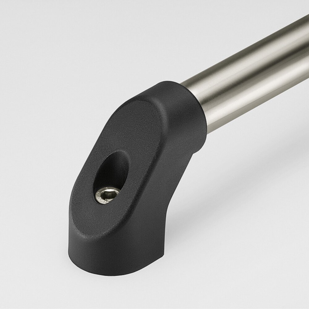 Close-up of black polyamide handle shank attached to a brushed stainless steel tube with a hexagon socket screw