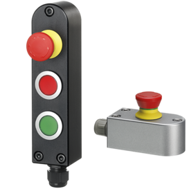 Two TG4 push button housings: a vertical black anodized housing with three buttons (red emergency stop, red push button, green push button) labeled TG4-05, and a horizontal natural aluminum housing with a red emergency stop button labeled TG4-20.