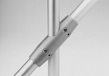 Silver metal tube connector with 50°/130° angle connecting three cylindrical tubes, secured by hex screws on a plain gray background.