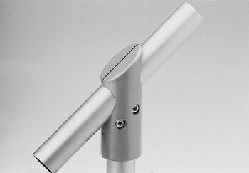 Close-up of a silver two-layered metallic T-shaped tube connector with an angled joint and two screws, connecting three cylindrical tubes