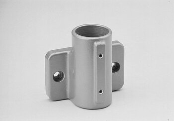 Ein-schaliges Wandlager aus Metall mit zylindrischer Öffnung und Befestigungsplatten mit Löchern