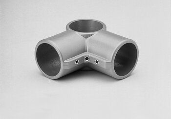 Metallic corner tube connector with three cylindrical openings and three fastening holes